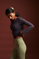 Back view of the Coal fitted full sleeve gym top paired with leggings