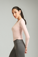 Back view of the Jellybean fitted full sleeve gym top paired with leggings