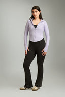 Black OnTheGo flare yoga pants designed for comfort, flexibility, and movement