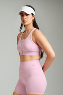 Bubblegum LevelUp zipper sports bra designed for comfort, support, and active workouts