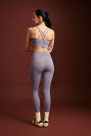 Close-up of amethyst OnTheGo leggings waistband, soft polyester-free fabric that stays in place during workouts