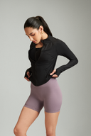 Front view of the Black OnTheGo gym jacket with a full zip design
