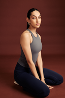 Front view of the Shadow fitted tank top with a minimal design