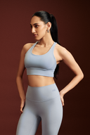 Frost strappy sports bra featuring a stylish cross-back design for workouts and yoga