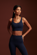 Ink Blue sports bra for gym workouts with a supportive cross-back design