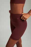 Maroon OnTheGo athletic shorts featuring soft stretch fabric and all-day comfort