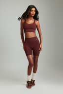 Maroon gym shorts designed for women seeking comfort, flexibility, and performance