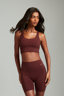 Maroon sports bra suitable for gym training, fitness classes, and everyday wear