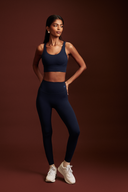 Mile Collective ink blue gym leggings, full-length front view showing high-rise waistband