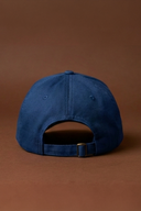 Navy blue gym cap with an adjustable fit for everyday wear and fitness