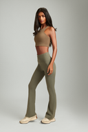 Olive flare pants women can wear for yoga, workouts, and casual outings