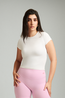 White OnTheGo baby tee designed for everyday comfort and a flattering fit