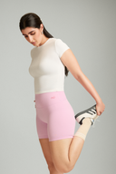 White OnTheGo fitted tank top style tee offering flexibility and all-day comfort