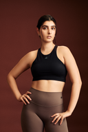 Woman wearing the Black cropped tank top for gym workouts