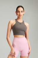 Woman wearing the Classic Gray cropped tank top for gym workouts