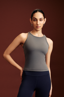 Woman wearing the Shadow fitted tank top for gym workouts
