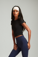 Women wearing Black OnTheGo baby tee with a sleek silhouette and soft stretch fabric