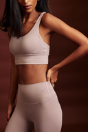 Women wearing Lavender Cross-Back Sports Bra for yoga, training, and active lifestyles