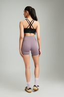 Women wearing Mauve OnTheGo running shorts with a supportive and lightweight fit