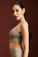 Women wearing Rhino Gray cross back bra with breathable stretch fabric and a secure fit